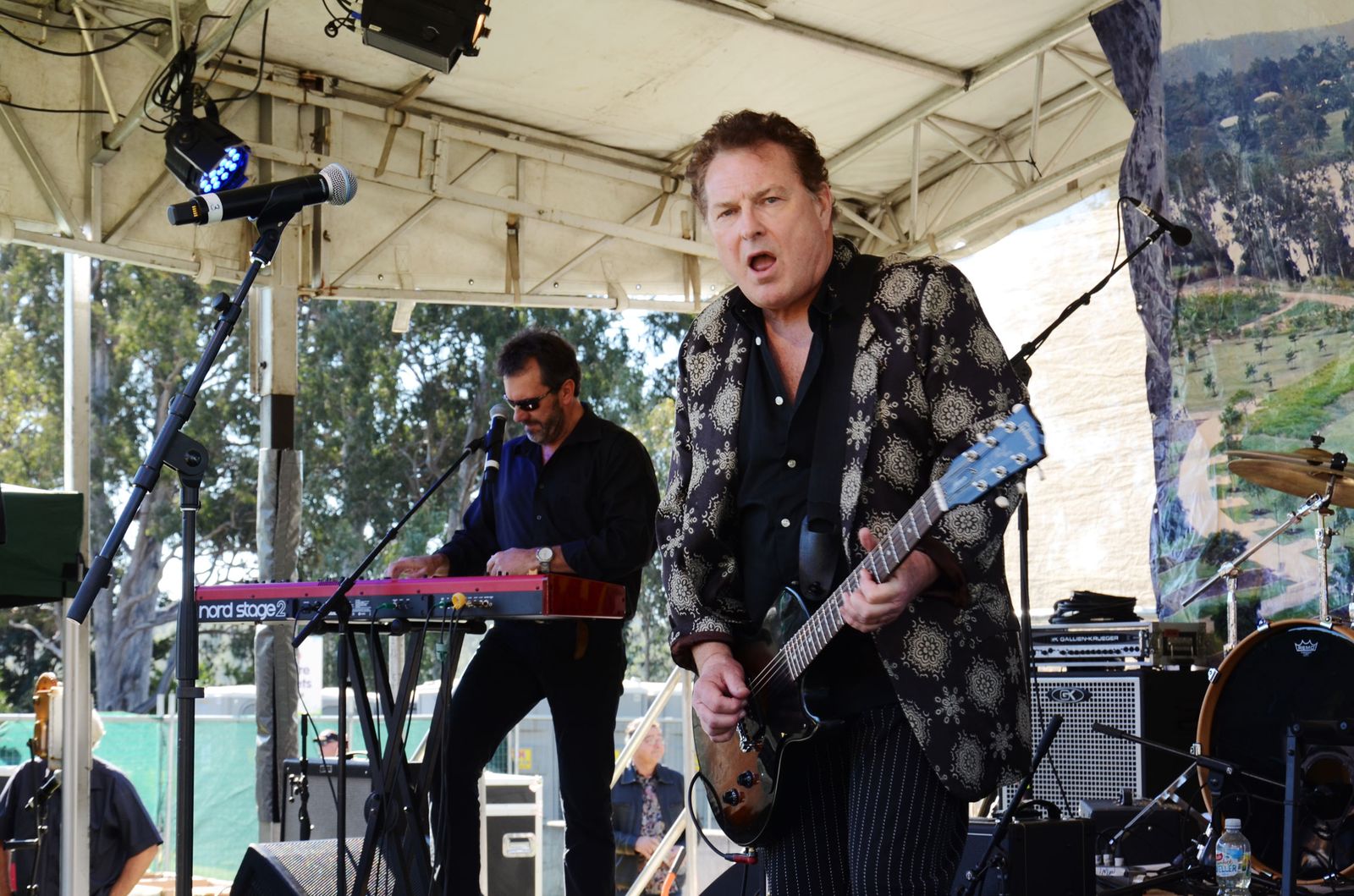 A band performing on the Centenary Rocks! stage